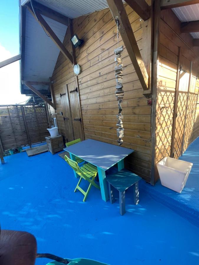 Duo d’appartement séparé par un couloir situé au bord de la mer Le Moule Esterno foto